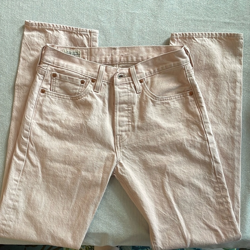 Levi's premium denim 501 button-fly jeans. Size 28 waist, 32 inseam. Peach.